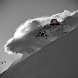 Red skier in the powder plexiglass photo