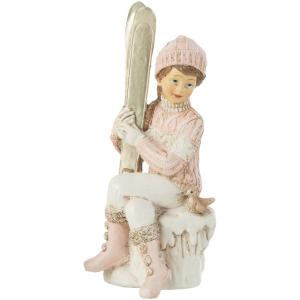 Petit fille avec ses skis