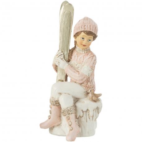 Petit fille avec ses skis