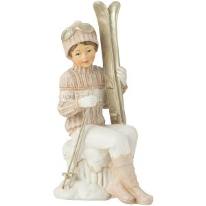 Petit garçon avec ses skis