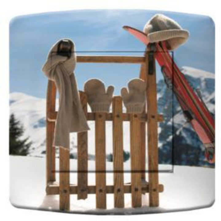Decorated switch old-fashioned sledge and gloves photo